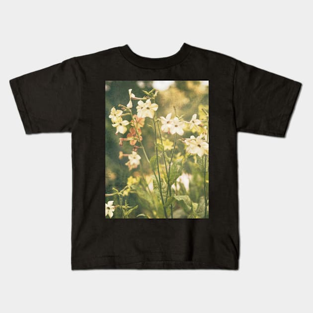 Yellow flowers blooming in a noody garden Kids T-Shirt by Amalus-files